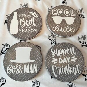 Set of 4 ceramic coasters with cork backing.